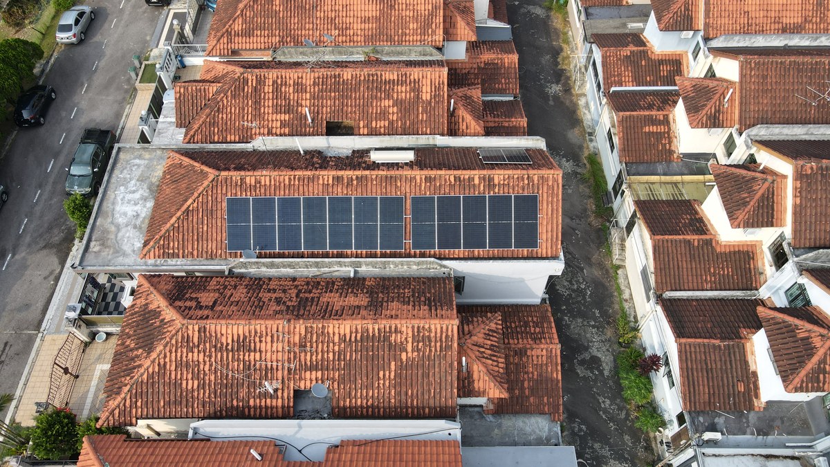 Residential terrace house rooftop solar installation Malaysia aerial
